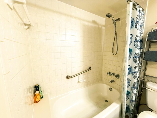 3658 Alder Dr Unit D1, West Palm Beach, FL 33417 - full bathroom with toilet and shower / bath combo with shower curtain