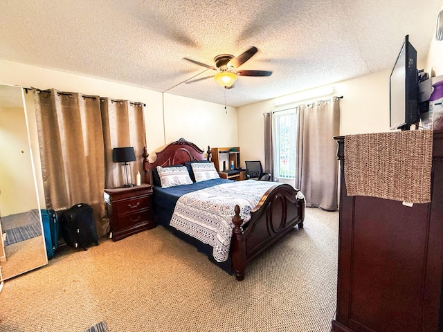 3658 Alder Dr Unit D1, West Palm Beach, FL 33417 - bedroom featuring light carpet, a textured ceiling, and a ceiling fan