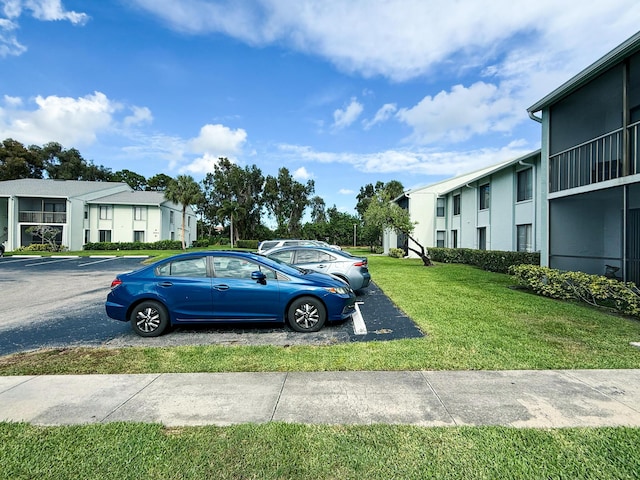 3658 Alder Dr Unit D1, West Palm Beach, FL 33417 - view of uncovered parking lot