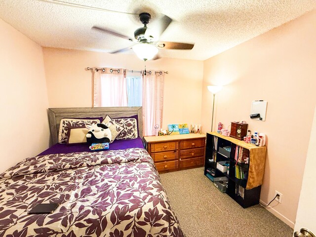 3658 Alder Dr Unit D1, West Palm Beach, FL 33417 - bedroom with light colored carpet, ceiling fan, and a textured ceiling