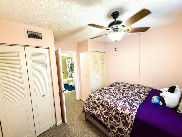 3658 Alder Dr Unit D1, West Palm Beach, FL 33417 - carpeted bedroom featuring a textured ceiling and ceiling fan