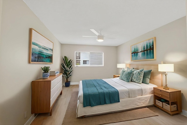 5574 Witney Dr Unit 104, Delray Beach, FL 33484 - bedroom featuring light wood-style flooring and a ceiling fan