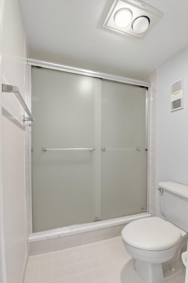 5574 Witney Dr Unit 104, Delray Beach, FL 33484 - full bathroom featuring toilet and a shower stall