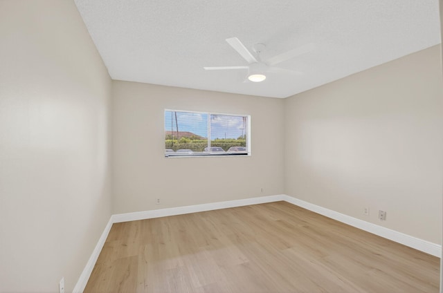 5574 Witney Dr Unit 104, Delray Beach, FL 33484 - unfurnished room featuring light wood-type flooring and ceiling fan
