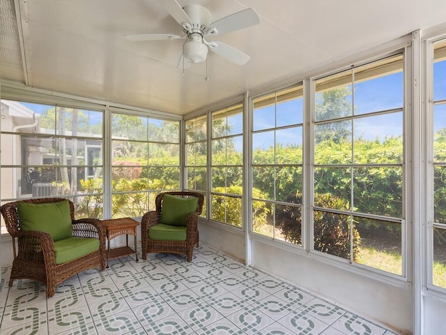 374 NW Sherry Ln, Port Saint Lucie, FL 34986 - sunroom featuring a ceiling fan and plenty of natural light