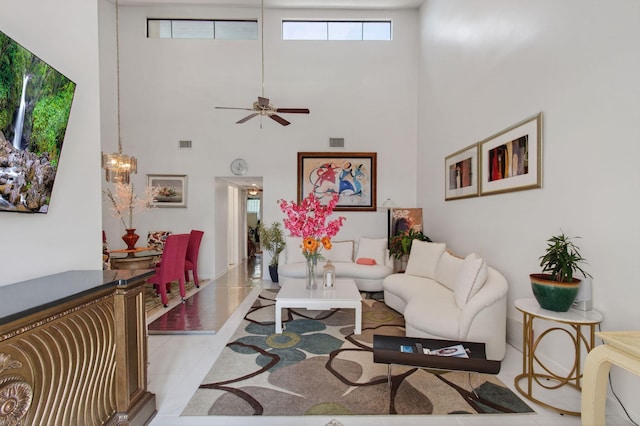 14085 Nesting Way Unit C, Delray Beach, FL 33484 - living area featuring a high ceiling and a chandelier