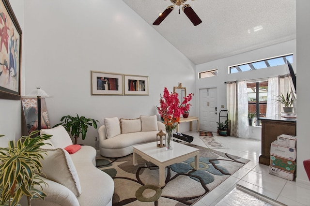 14085 Nesting Way Unit C, Delray Beach, FL 33484 - living room with high vaulted ceiling, a ceiling fan, and a textured ceiling
