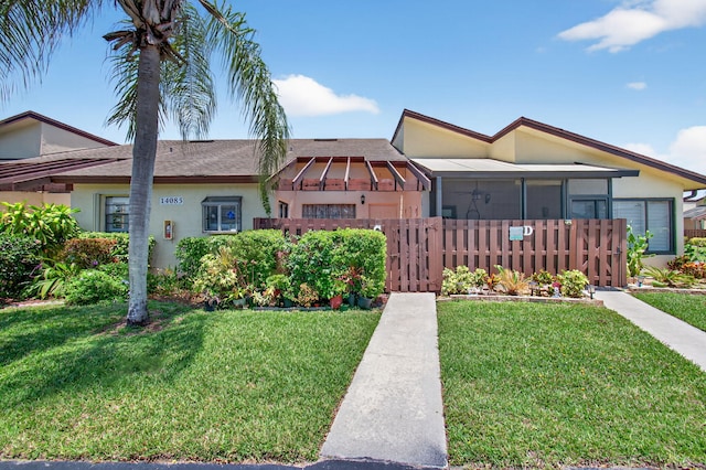 14085 Nesting Way Unit C, Delray Beach, FL 33484 - single story home with stucco siding and a sunroom