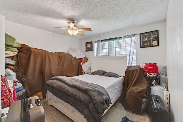 14085 Nesting Way Unit C, Delray Beach, FL 33484 - bedroom with a textured ceiling and a ceiling fan