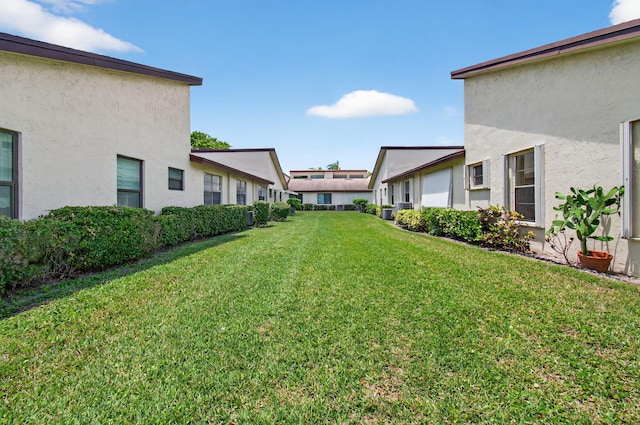 14085 Nesting Way Unit C, Delray Beach, FL 33484 - view of green lawn featuring a residential view