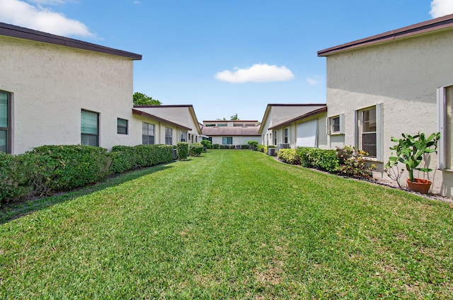 14085 Nesting Way Unit C, Delray Beach, FL 33484 - view of green lawn with a residential view