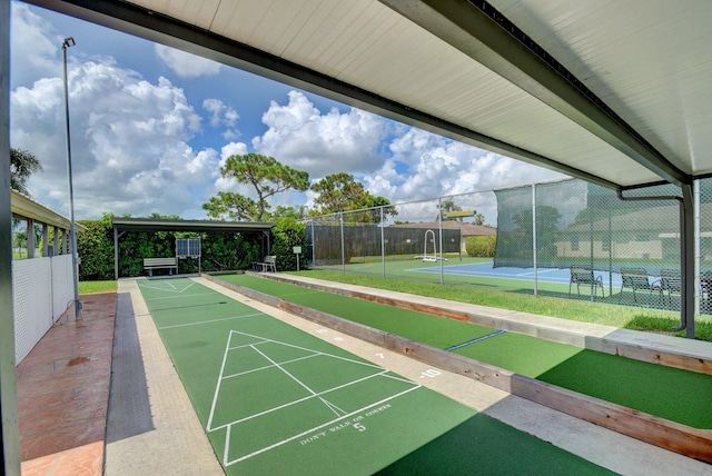 14085 Nesting Way Unit C, Delray Beach, FL 33484 - view of property's community featuring a game area, shuffleboard, and a tennis court