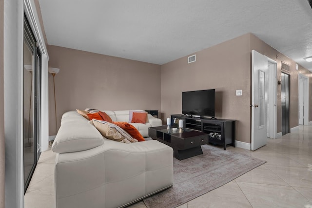 7670 NW 79th Ave Unit O3, Tamarac, FL 33321 - living area featuring baseboards