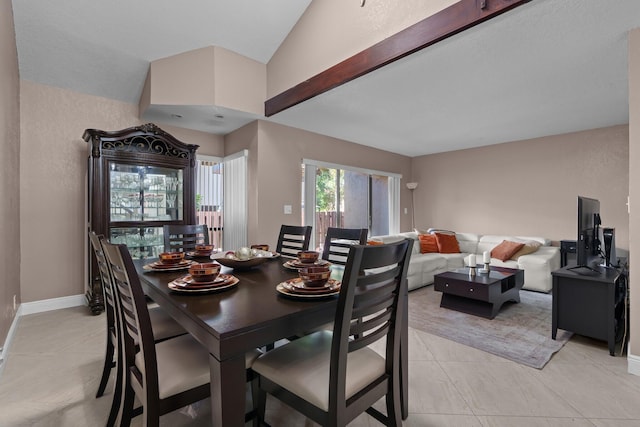 7670 NW 79th Ave Unit O3, Tamarac, FL 33321 - dining area with lofted ceiling and light tile patterned floors