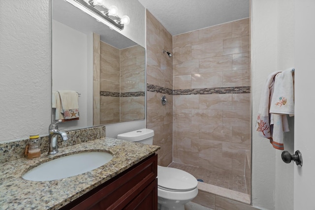 7670 NW 79th Ave Unit O3, Tamarac, FL 33321 - full bath with tiled shower, vanity, and a textured wall