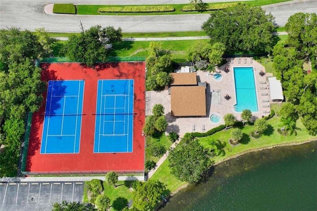7670 NW 79th Ave Unit O3, Tamarac, FL 33321 - drone / aerial view of a pool area and a nearby body of water