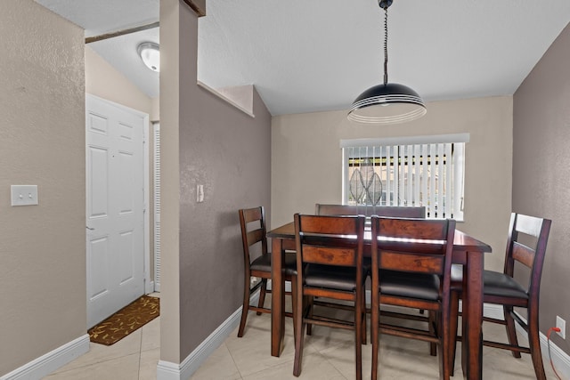 7670 NW 79th Ave Unit O3, Tamarac, FL 33321 - dining room with a textured wall and light tile patterned floors