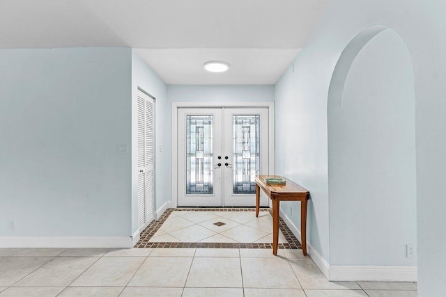 7800 Texas Trl, Boca Raton, FL 33487 - tiled entryway featuring arched walkways and french doors