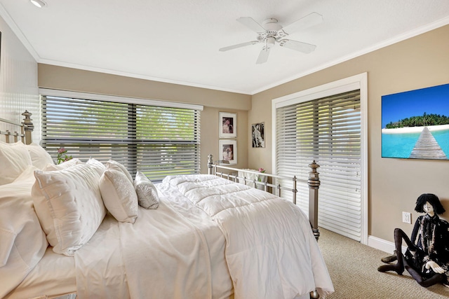 6890 Willow Wood Dr Unit 206, Boca Raton, FL 33434 - carpeted bedroom featuring ornamental molding, multiple windows, and a ceiling fan