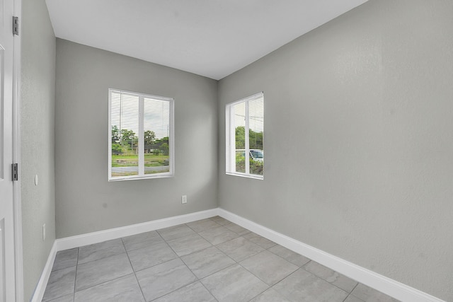 306 N N 28th St, Fort Pierce, FL 34947 - empty room with light tile patterned floors