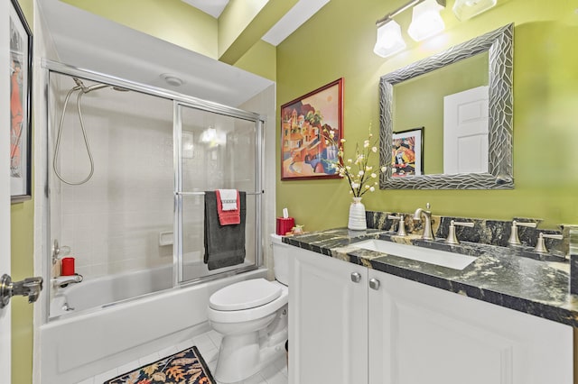 11265 Bannock Ave Unit 5, Boynton Beach, FL 33437 - bathroom featuring vanity, shower / bath combination with glass door, and tile patterned flooring