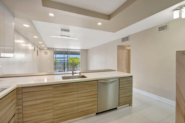 3600 NE 170th St Unit 407, North Miami Beach, FL 33160 - kitchen featuring stainless steel dishwasher, modern cabinets, light countertops, and recessed lighting
