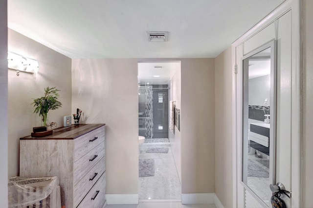3600 NE 170th St Unit 407, North Miami Beach, FL 33160 - hallway featuring baseboards