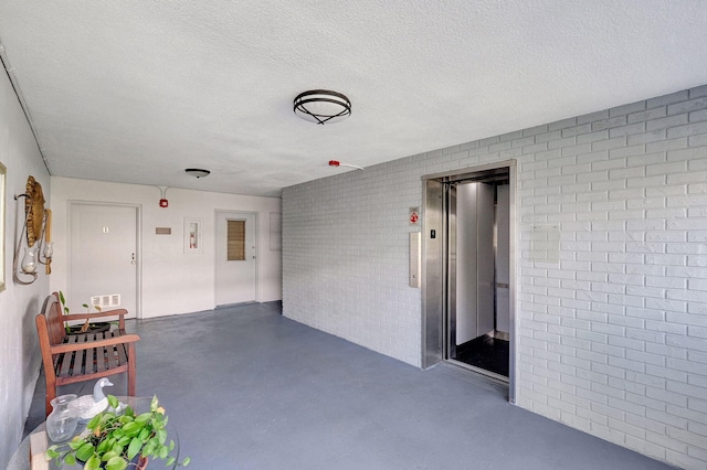 3600 NE 170th St Unit 407, North Miami Beach, FL 33160 - view of patio featuring elevator