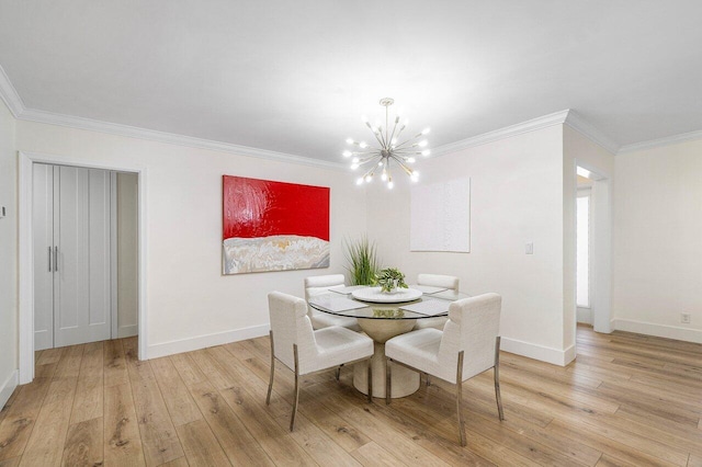 881 Elderberry Way, Boca Raton, FL 33486 - dining area with a chandelier, ornamental molding, and light wood finished floors