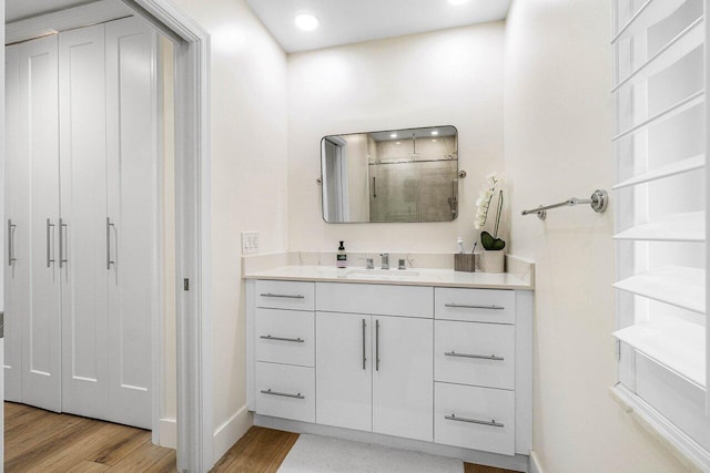 881 Elderberry Way, Boca Raton, FL 33486 - full bathroom featuring wood finished floors, vanity, an enclosed shower, and recessed lighting