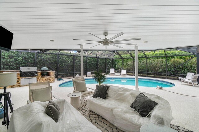 881 Elderberry Way, Boca Raton, FL 33486 - swimming pool with a lanai, a patio area, and an outdoor kitchen