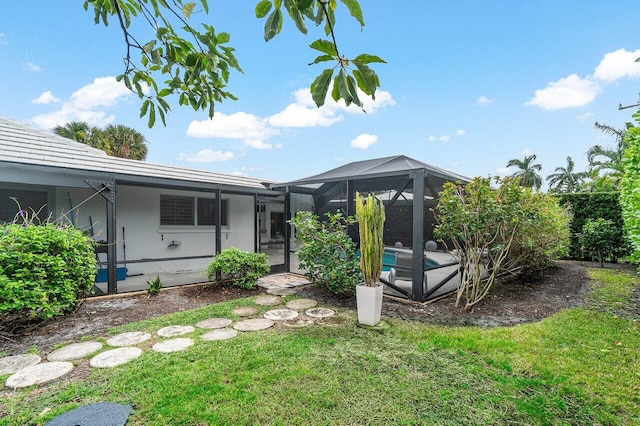 881 Elderberry Way, Boca Raton, FL 33486 - back of house featuring an outdoor pool, a lanai, and a yard
