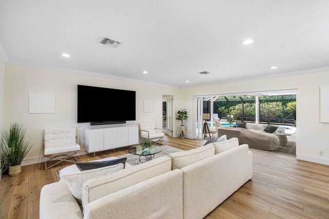 881 Elderberry Way, Boca Raton, FL 33486 - living area featuring crown molding, recessed lighting, and light wood-style floors