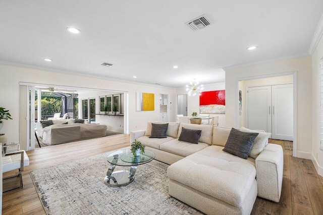 881 Elderberry Way, Boca Raton, FL 33486 - living area with wood-type flooring, crown molding, recessed lighting, and a chandelier