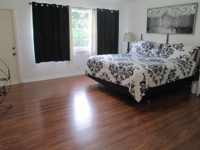 14572 Canalview Dr Unit C, Delray Beach, FL 33484 - bedroom featuring wood finished floors and baseboards