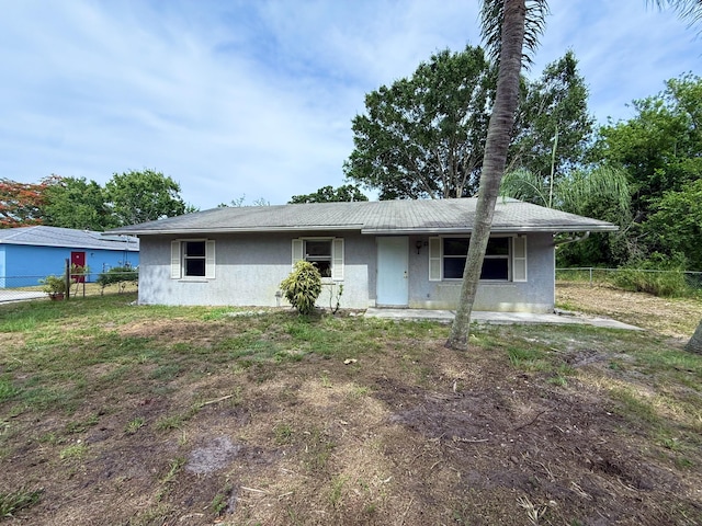 2564 Navajo Ave, Fort Pierce, FL 34946 - view of front of house featuring stucco siding