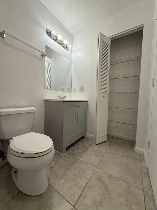 2564 Navajo Ave, Fort Pierce, FL 34946 - bathroom with vanity and a closet