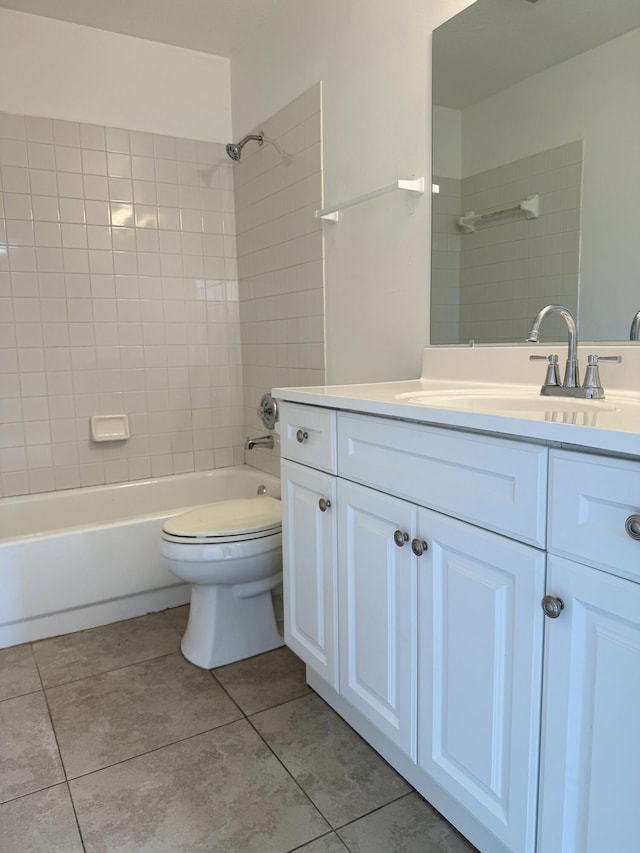 2564 Navajo Ave, Fort Pierce, FL 34946 - bathroom featuring vanity, tile patterned floors, and washtub / shower combination
