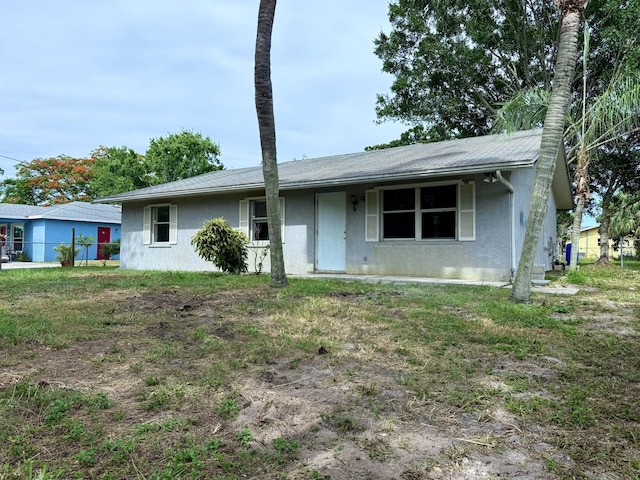 2564 Navajo Ave, Fort Pierce, FL 34946 - ranch-style home featuring stucco siding