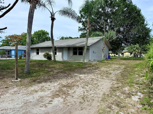 2564 Navajo Ave, Fort Pierce, FL 34946 - view of front facade with stucco siding