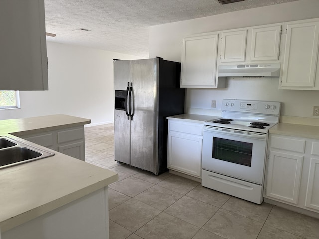 2564 Navajo Ave, Fort Pierce, FL 34946 - kitchen with under cabinet range hood, electric range, stainless steel refrigerator with ice dispenser, light tile patterned floors, and light countertops