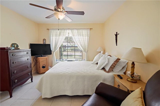 2582 Longwood Blvd, Melbourne, FL 32934 - bedroom with light tile patterned floors and ceiling fan