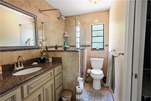 2582 Longwood Blvd, Melbourne, FL 32934 - full bath featuring tile walls, vanity, a shower, and tile patterned flooring