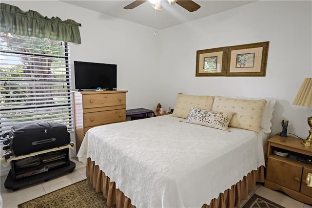 2582 Longwood Blvd, Melbourne, FL 32934 - bedroom with light tile patterned floors and a ceiling fan