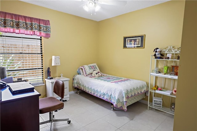 2582 Longwood Blvd, Melbourne, FL 32934 - bedroom with a desk, light tile patterned floors, and a ceiling fan