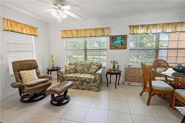 2582 Longwood Blvd, Melbourne, FL 32934 - living area featuring a ceiling fan, plenty of natural light, and light tile patterned floors