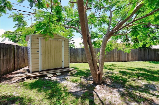 2582 Longwood Blvd, Melbourne, FL 32934 - fenced backyard featuring a storage unit