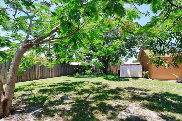 2582 Longwood Blvd, Melbourne, FL 32934 - fenced backyard featuring a storage shed