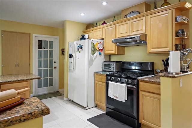 2582 Longwood Blvd, Melbourne, FL 32934 - kitchen with black range with gas cooktop, under cabinet range hood, white fridge with ice dispenser, light brown cabinetry, and recessed lighting