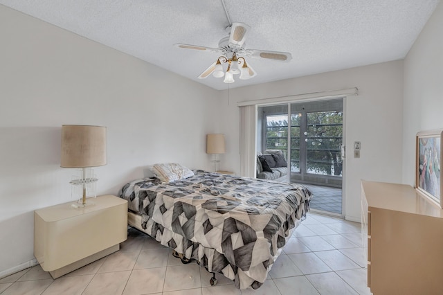 1902 Bermuda Cir Unit L2, Coconut Creek, FL 33066 - bedroom featuring access to outside, a textured ceiling, light tile patterned floors, and ceiling fan